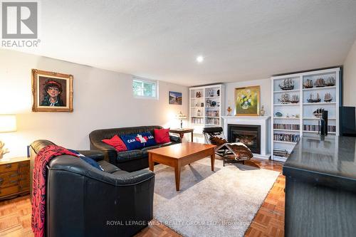 12 Kirk Bradden Road E, Toronto, ON - Indoor Photo Showing Living Room With Fireplace