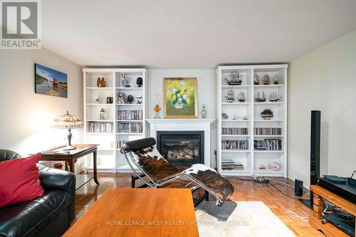 12 Kirk Bradden Road E, Toronto (Stonegate-Queensway), ON - Indoor Photo Showing Living Room With Fireplace