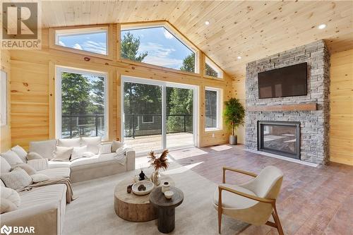 1121 Farm Lake Lane, Ardoch, ON - Indoor Photo Showing Living Room With Fireplace