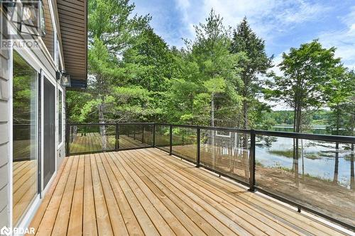 1121 Farm Lake Lane, Ardoch, ON - Outdoor With Balcony With Exterior