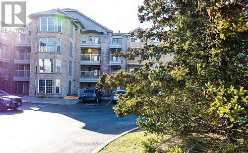 306 - 1450 Bishops Gate, Oakville (Glen Abbey), ON - Outdoor With Balcony With Facade