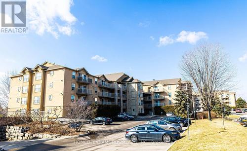 306 - 1450 Bishops Gate, Oakville (Glen Abbey), ON - Outdoor With Balcony With Facade