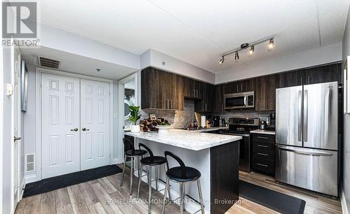 306 - 1450 Bishops Gate, Oakville (Glen Abbey), ON - Indoor Photo Showing Kitchen With Stainless Steel Kitchen