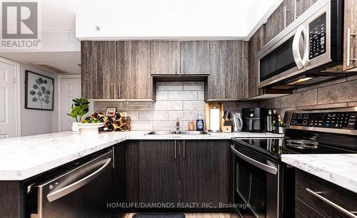 306 - 1450 Bishops Gate, Oakville (Glen Abbey), ON - Indoor Photo Showing Kitchen With Double Sink