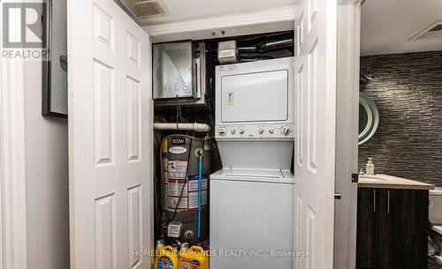 306 - 1450 Bishops Gate, Oakville (Glen Abbey), ON - Indoor Photo Showing Laundry Room