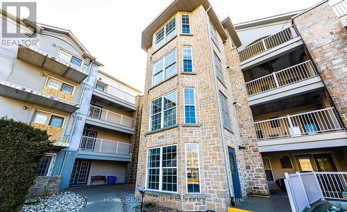 306 - 1450 Bishops Gate, Oakville (Glen Abbey), ON - Outdoor With Balcony With Facade