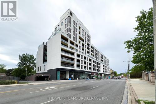 202 - 1100 Kingston Road, Toronto E06, ON - Outdoor With Balcony With Facade