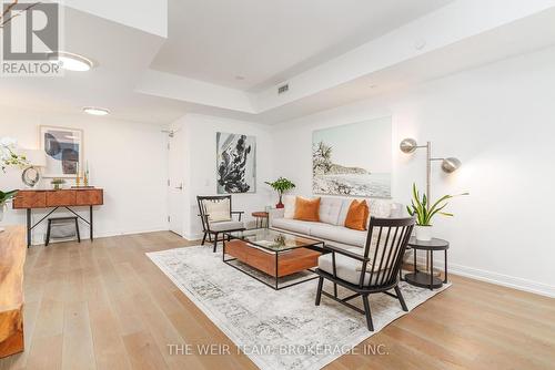 202 - 1100 Kingston Road, Toronto E06, ON - Indoor Photo Showing Living Room