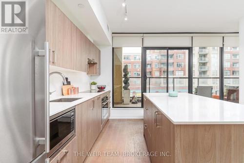 202 - 1100 Kingston Road, Toronto E06, ON - Indoor Photo Showing Kitchen With Upgraded Kitchen