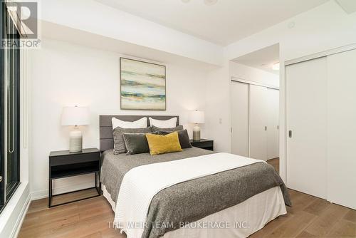 202 - 1100 Kingston Road, Toronto (Birchcliffe-Cliffside), ON - Indoor Photo Showing Bedroom