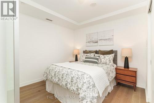 202 - 1100 Kingston Road, Toronto E06, ON - Indoor Photo Showing Bedroom