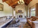 Salon - 316 Ch. Des Fondateurs, La Minerve, QC  - Indoor Photo Showing Living Room With Fireplace 