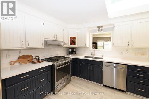 36 Broad Street, Penetanguishene, ON - Indoor Photo Showing Kitchen With Double Sink