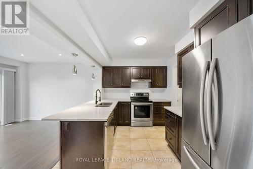 244 Ellen Davidson Drive, Oakville, ON - Indoor Photo Showing Kitchen With Stainless Steel Kitchen With Double Sink With Upgraded Kitchen