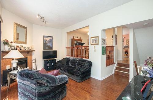 445 Stone Church Road W|Unit #15, Hamilton, ON - Indoor Photo Showing Living Room With Fireplace