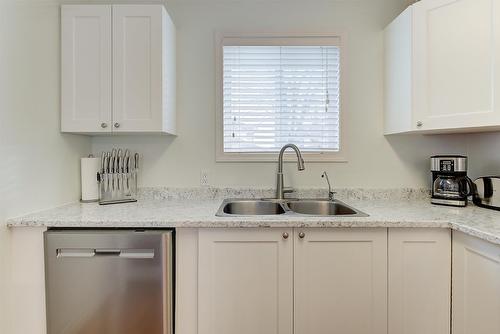 131-133 Wyndham Crescent, Kelowna, BC - Indoor Photo Showing Kitchen With Double Sink