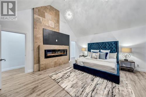 907 Reedmere Road, Windsor, ON - Indoor Photo Showing Bedroom With Fireplace