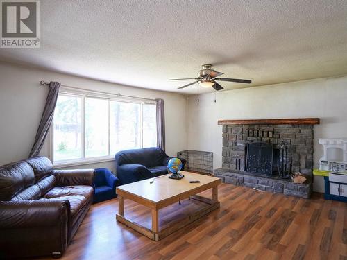 767 Spruce Street, Quesnel, BC - Indoor Photo Showing Living Room With Fireplace