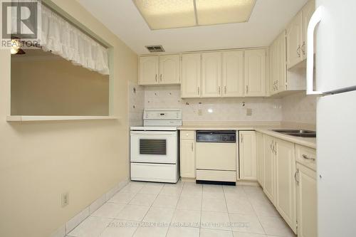 908 - 20 Dean Park Road, Toronto, ON - Indoor Photo Showing Kitchen With Double Sink