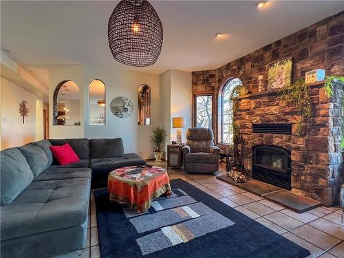 3211 Mcdonald Avenue, Brandon, MB - Indoor Photo Showing Living Room With Fireplace