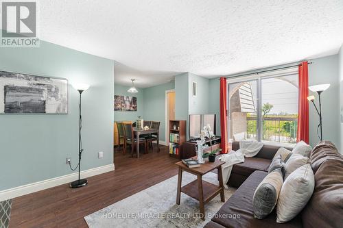 267 - 2095 Roche Court, Mississauga, ON - Indoor Photo Showing Living Room