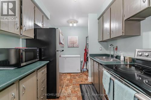 267 - 2095 Roche Court, Mississauga, ON - Indoor Photo Showing Kitchen With Double Sink