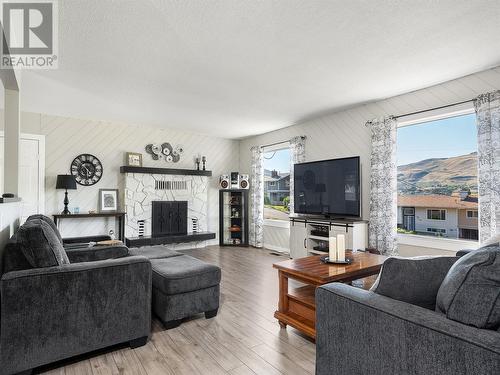 6992 Longacre Drive, Vernon, BC - Indoor Photo Showing Living Room With Fireplace