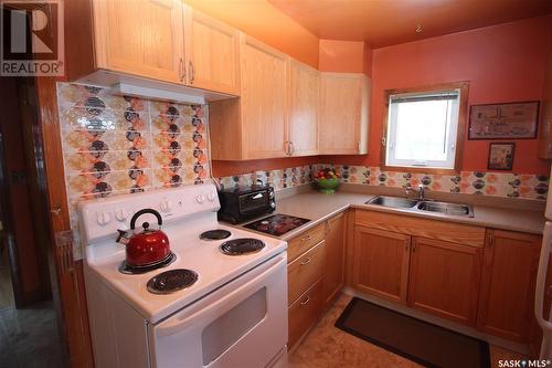 317 2Nd Avenue E, Watrous, SK - Indoor Photo Showing Kitchen With Double Sink