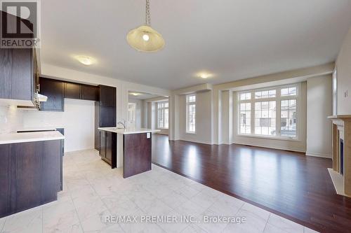 2 Jadite Street, Whitby, ON - Indoor Photo Showing Kitchen With Fireplace