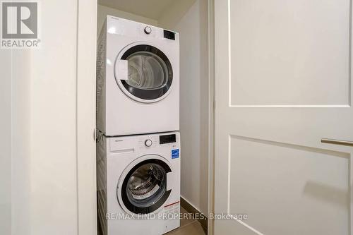 Th 06 - 21 Park Street E, Mississauga, ON - Indoor Photo Showing Laundry Room
