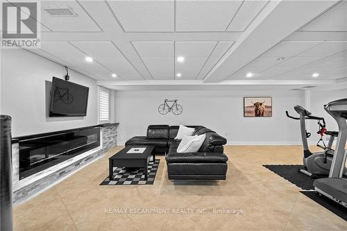 715 Deervalley Road, Hamilton, ON - Indoor Photo Showing Gym Room With Fireplace