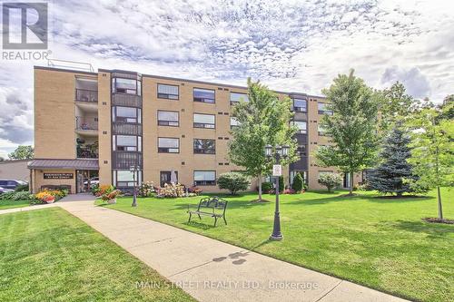 202 - 41 Ash Street, Uxbridge, ON - Outdoor With Facade