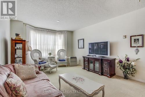 202 - 41 Ash Street, Uxbridge, ON - Indoor Photo Showing Living Room