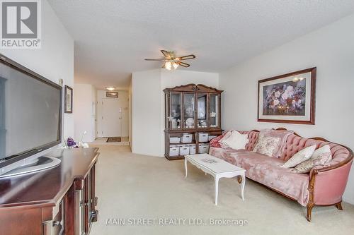 202 - 41 Ash Street, Uxbridge, ON - Indoor Photo Showing Living Room