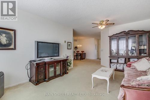 202 - 41 Ash Street, Uxbridge, ON - Indoor Photo Showing Living Room