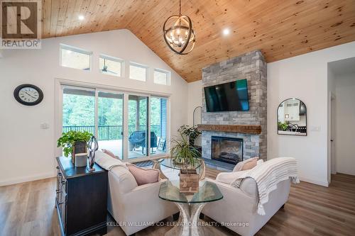 13199 16 County Road, Severn, ON - Indoor Photo Showing Living Room With Fireplace