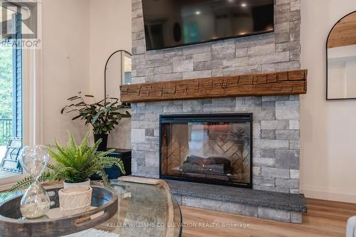 13199 16 County Road, Severn, ON - Indoor Photo Showing Living Room With Fireplace