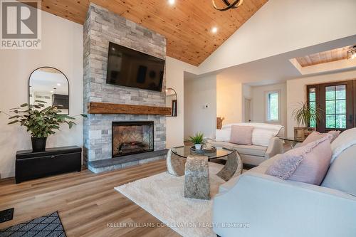 13199 16 County Road, Severn, ON - Indoor Photo Showing Living Room With Fireplace