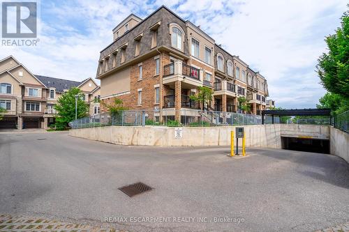 125 - 2441 Greenwich Drive E, Oakville, ON - Outdoor With Facade