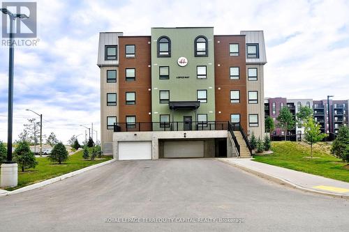 212 - 6 Spice Way, Barrie, ON - Outdoor With Facade