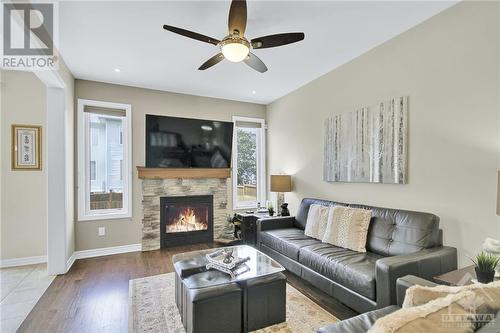 128 Lily Pond Street, Ottawa, ON - Indoor Photo Showing Living Room With Fireplace