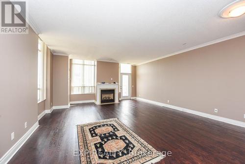 3205 - 35 Kingsbridge Garden Circle, Mississauga (Hurontario), ON - Indoor Photo Showing Living Room With Fireplace