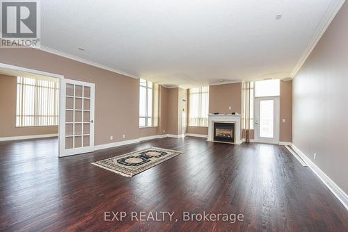 3205 - 35 Kingsbridge Garden Circle, Mississauga (Hurontario), ON - Indoor Photo Showing Living Room With Fireplace