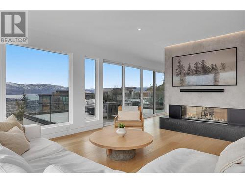 1190 Stoneypointe Court, Kelowna, BC - Indoor Photo Showing Living Room With Fireplace