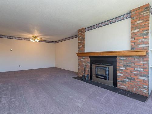 205-2286 Henry Ave, Sidney, BC - Indoor With Fireplace