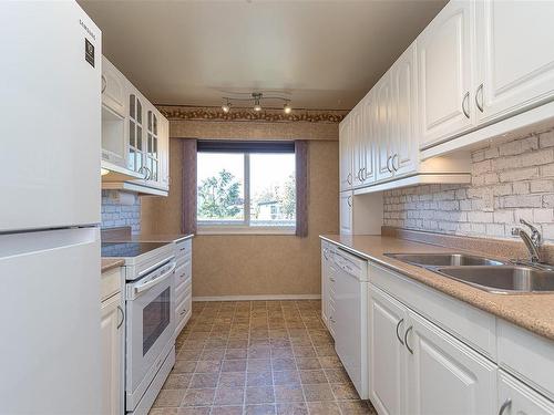 205-2286 Henry Ave, Sidney, BC - Indoor Photo Showing Kitchen With Double Sink