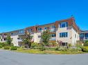 205-2286 Henry Ave, Sidney, BC  - Outdoor With Balcony With Facade 