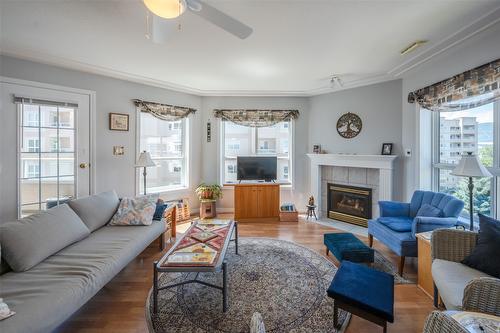 507-2265 Atkinson Street, Penticton, BC - Indoor Photo Showing Living Room With Fireplace