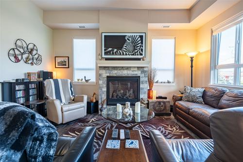 206-3255 Okanagan Street, Armstrong, BC - Indoor Photo Showing Living Room With Fireplace