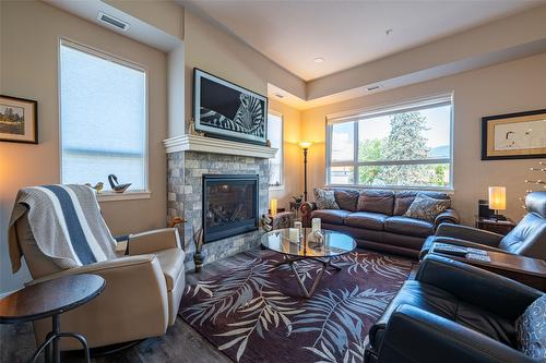 206-3255 Okanagan Street, Armstrong, BC - Indoor Photo Showing Living Room With Fireplace